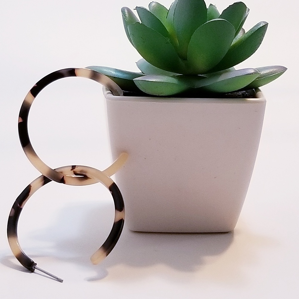 Small light brown acrylic hoops